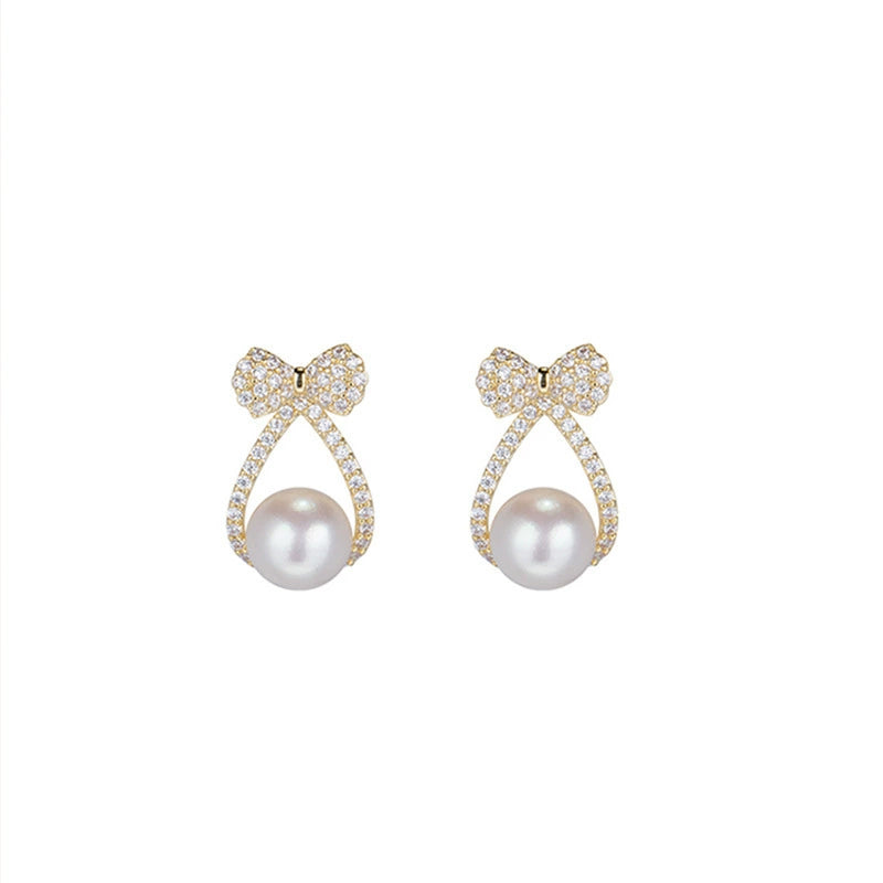 Just Lil Things Elegant Pearl Earring With Silver Bow Accents jlt13299