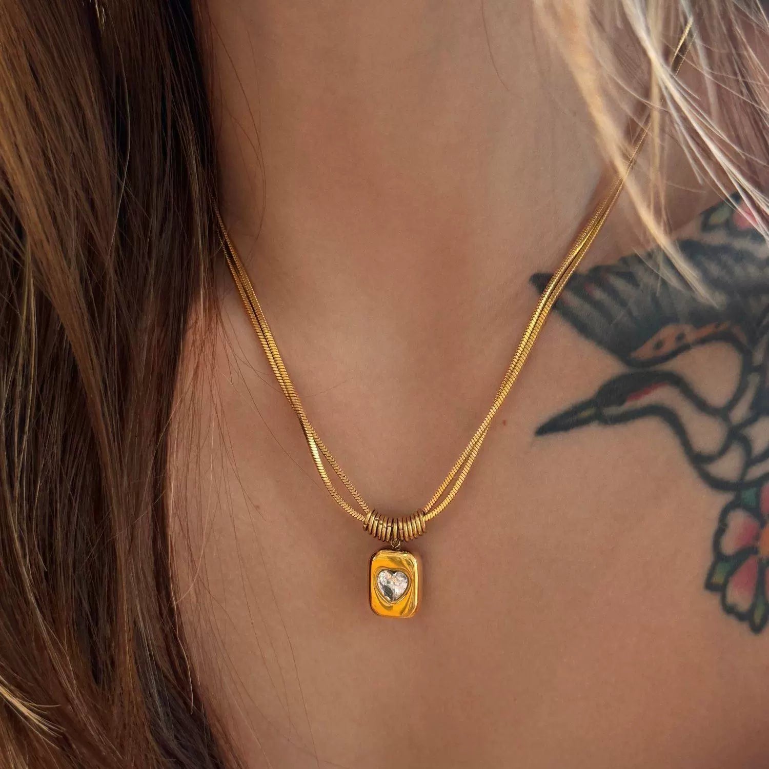 Just Lil Things Chunky Heart Pendant Necklace – Bold Rectangular Charm with Embedded Crystal and Stacked Ring Detail jltn1588