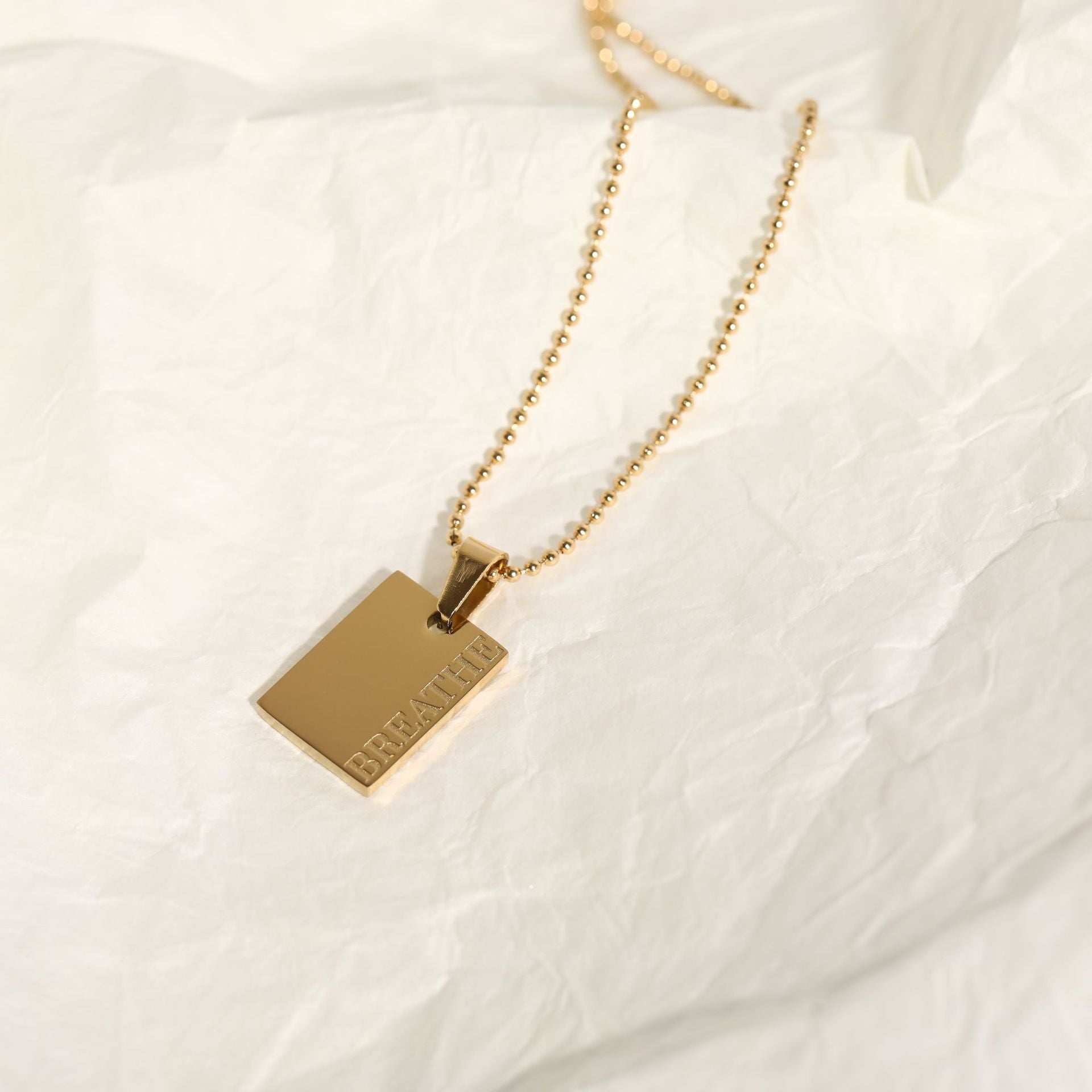 Gold "Breathe" Engraved Necklace – Minimalist Gold-Color Pendant for Mindfulness and Relaxation-jltn0636