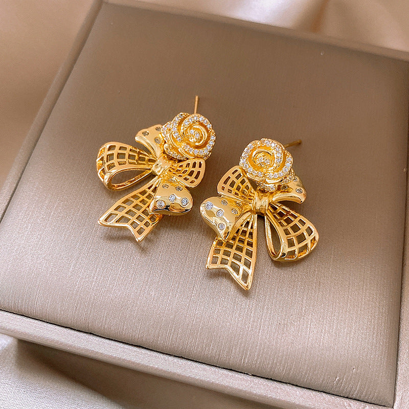Hollow Beaded Bow Gold Pin Earrings JLT12877