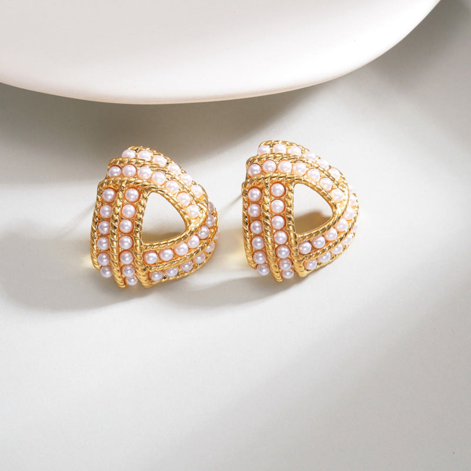 Elegant Triangle Stud Earrings with Pearl Detailing JLT13074