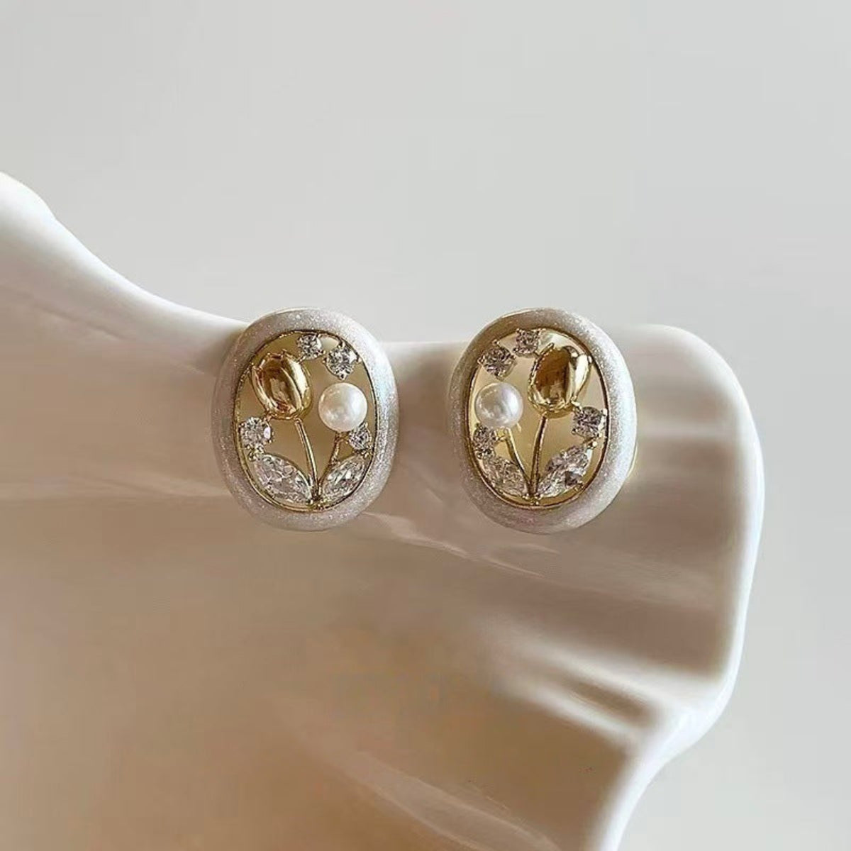 Gold-Tone Oval Floral Stud Earrings JLT14060