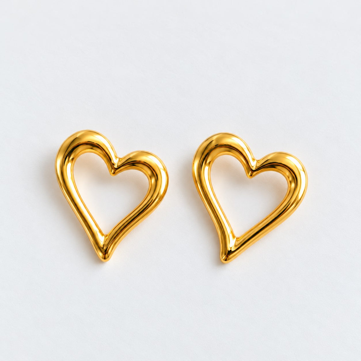 Sleek Gold Heart Outline Stud Earrings JLT14147