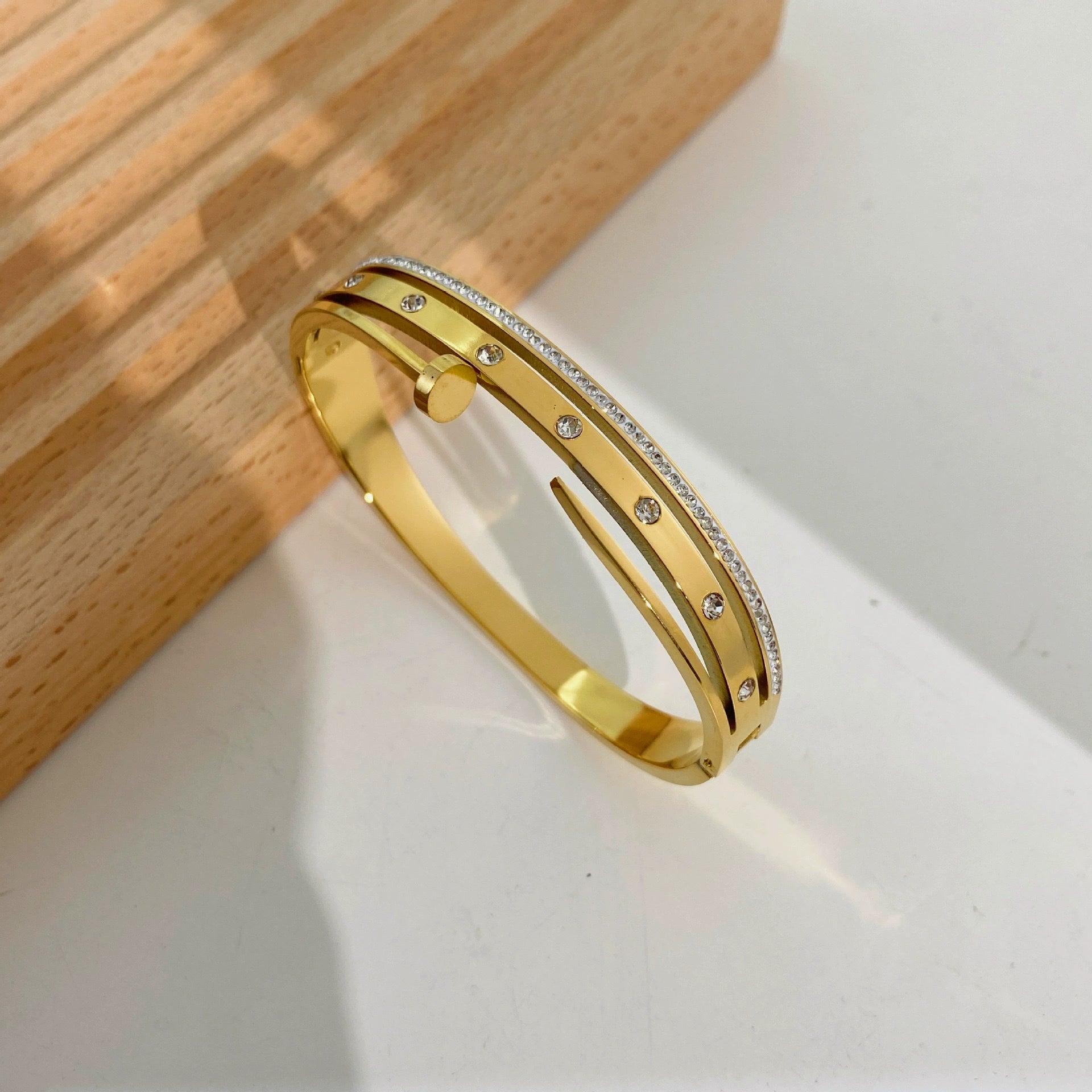 Anti-tarnish Contemporary Gold Nail Accent and Crystal Designer Bracelet JLTB0735