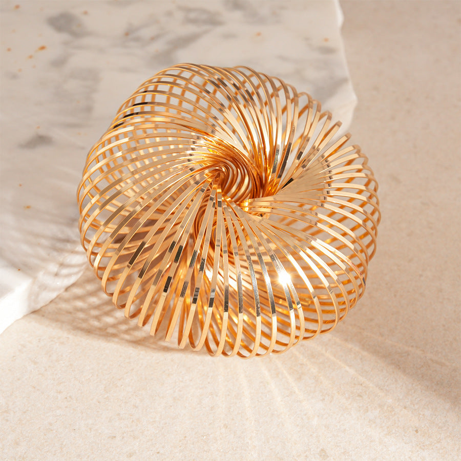 Elegant Gold Torus Coil Bracelet: A Symbol of Infinite Flow and Modern Artistry JLTB0825