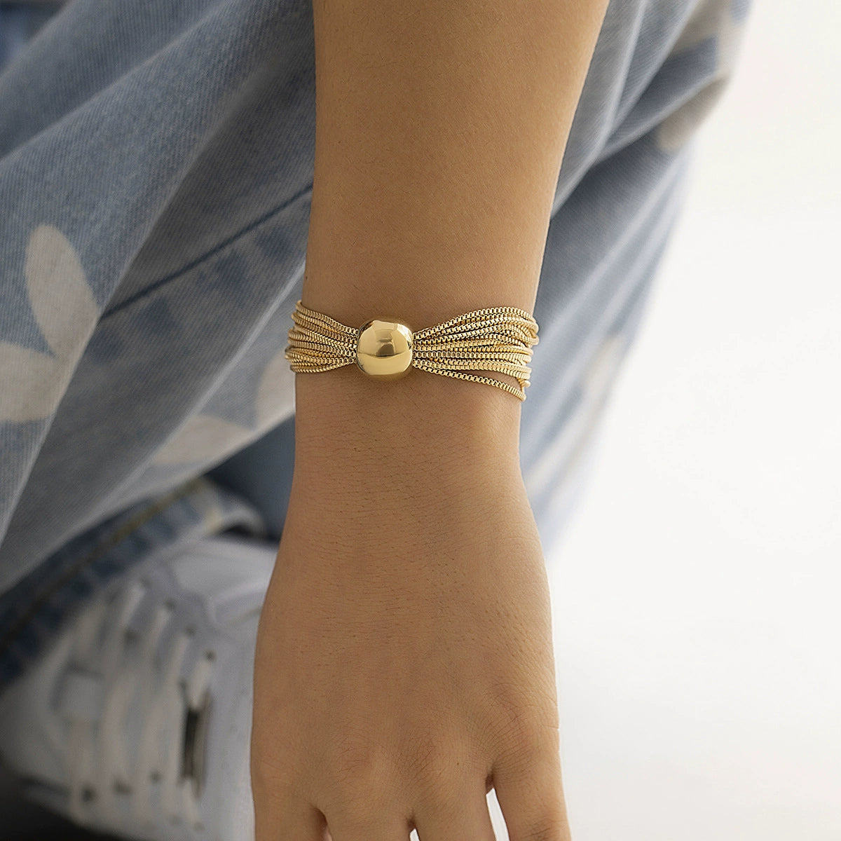 Elegant Multi-Chain Gold-tone Bracelet with Polished Bead Centerpiece JLTB0842