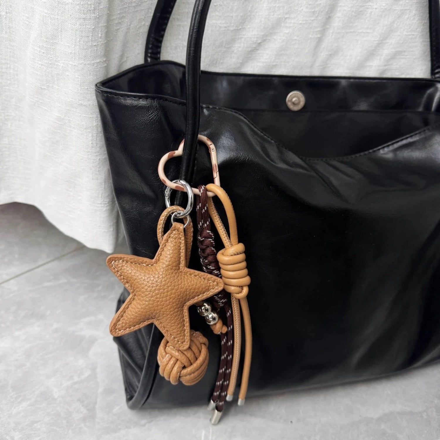 Tan Leather Star Tassel Keychain JLTKC0007