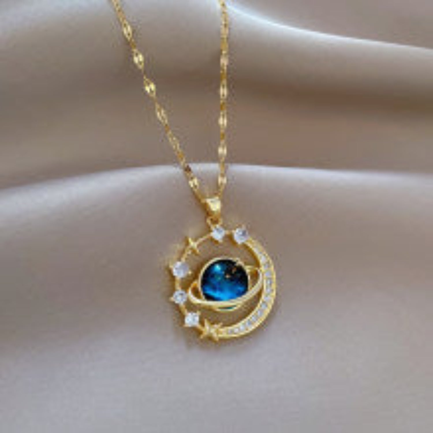 Celestial-Themed Gold Necklace with Moon, Stars, and Crystal Details JLTN1348