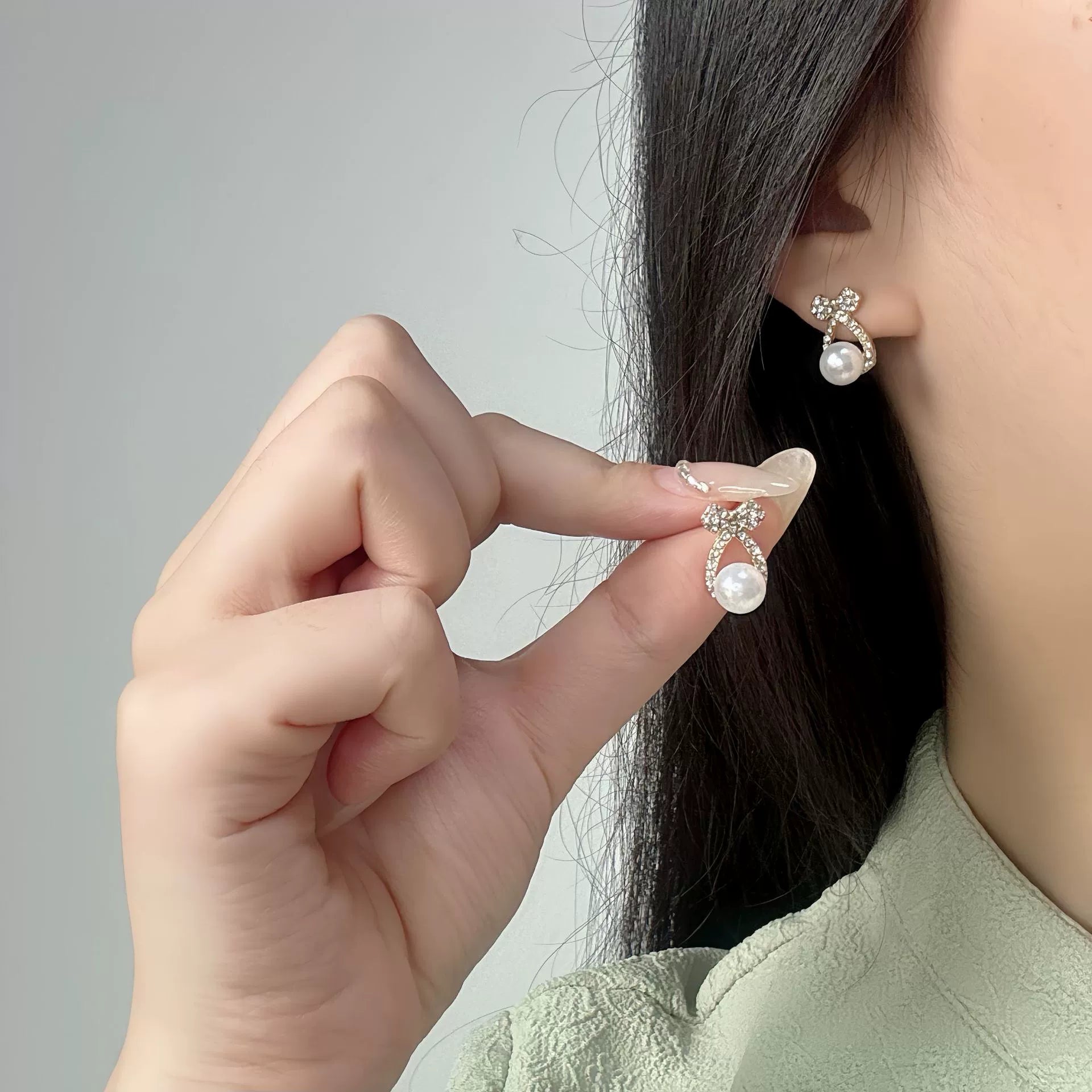 Just Lil Things Elegant Pearl Earring With Silver Bow Accents jlt13299