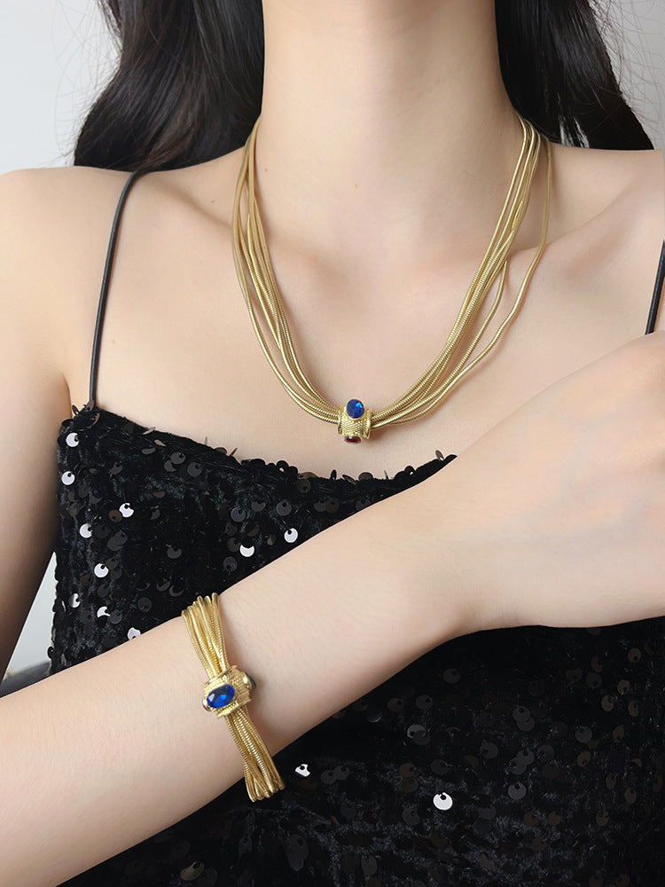 Just Lil Things Artificial Elegant Multi-Strand Gold Mesh with Ruby Accent Bracelet - jltb0520