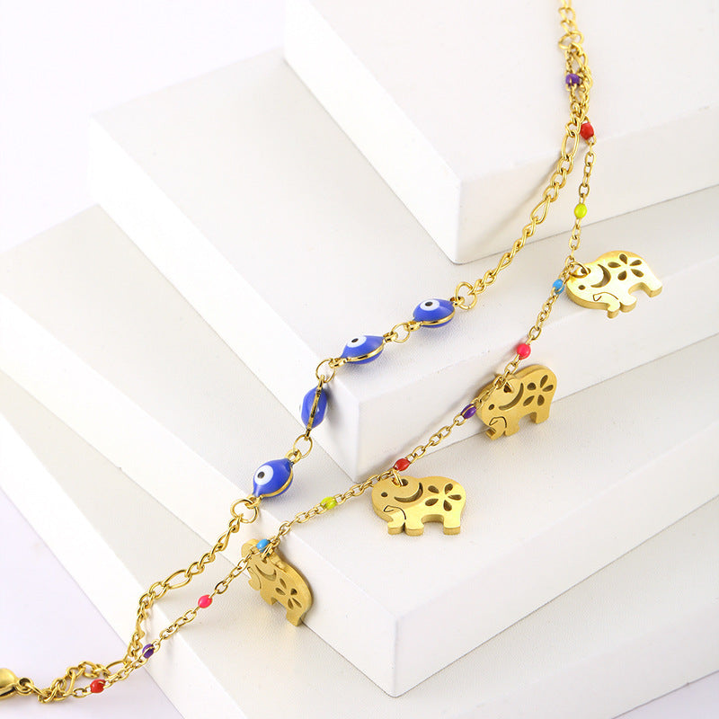 Golden Elephant & Evil Eye Charm Bracelet – Boho Chic Layered Chain Bracelet JLTB0542