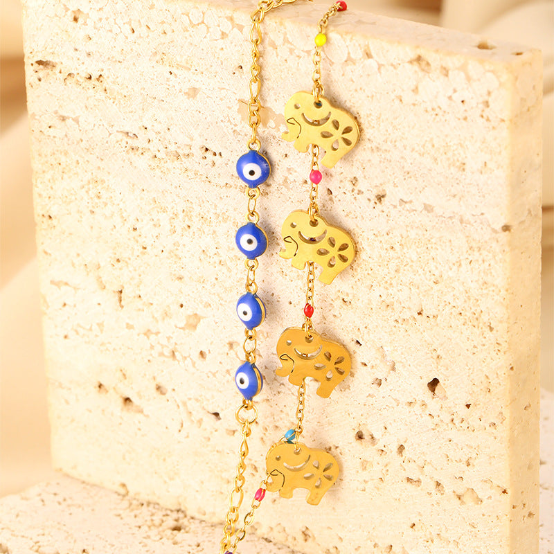 Golden Elephant & Evil Eye Charm Bracelet – Boho Chic Layered Chain Bracelet JLTB0542