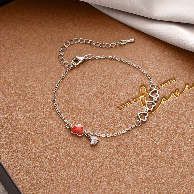 Just Lil Things Artificial Red Heart Charm with Delicate Hearts Silver-tone Bracelets jltb0221