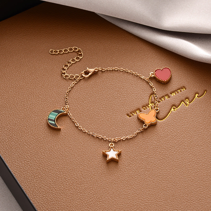just-lil-things-artificial-Celestial Charm Bracelet – Moon, Star, Butterfly & Heart Design-bracelets-jltb0223