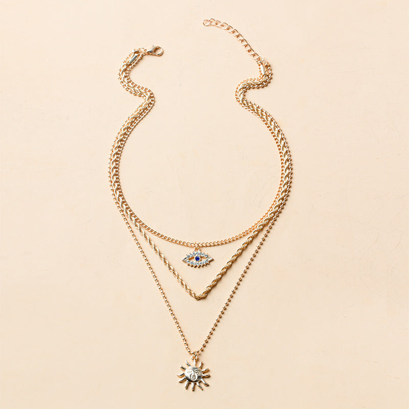 Gold-color Layered Necklace with Sun and Evil Eye Charms – Bohemian Multi-Layered Jewelry-jltn0521
