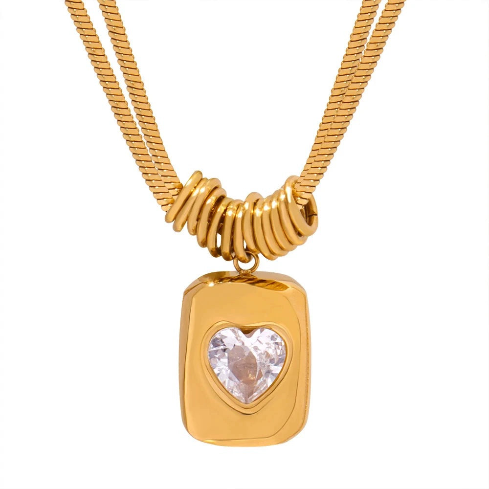 Just Lil Things Chunky Heart Pendant Necklace – Bold Rectangular Charm with Embedded Crystal and Stacked Ring Detail jltn1588