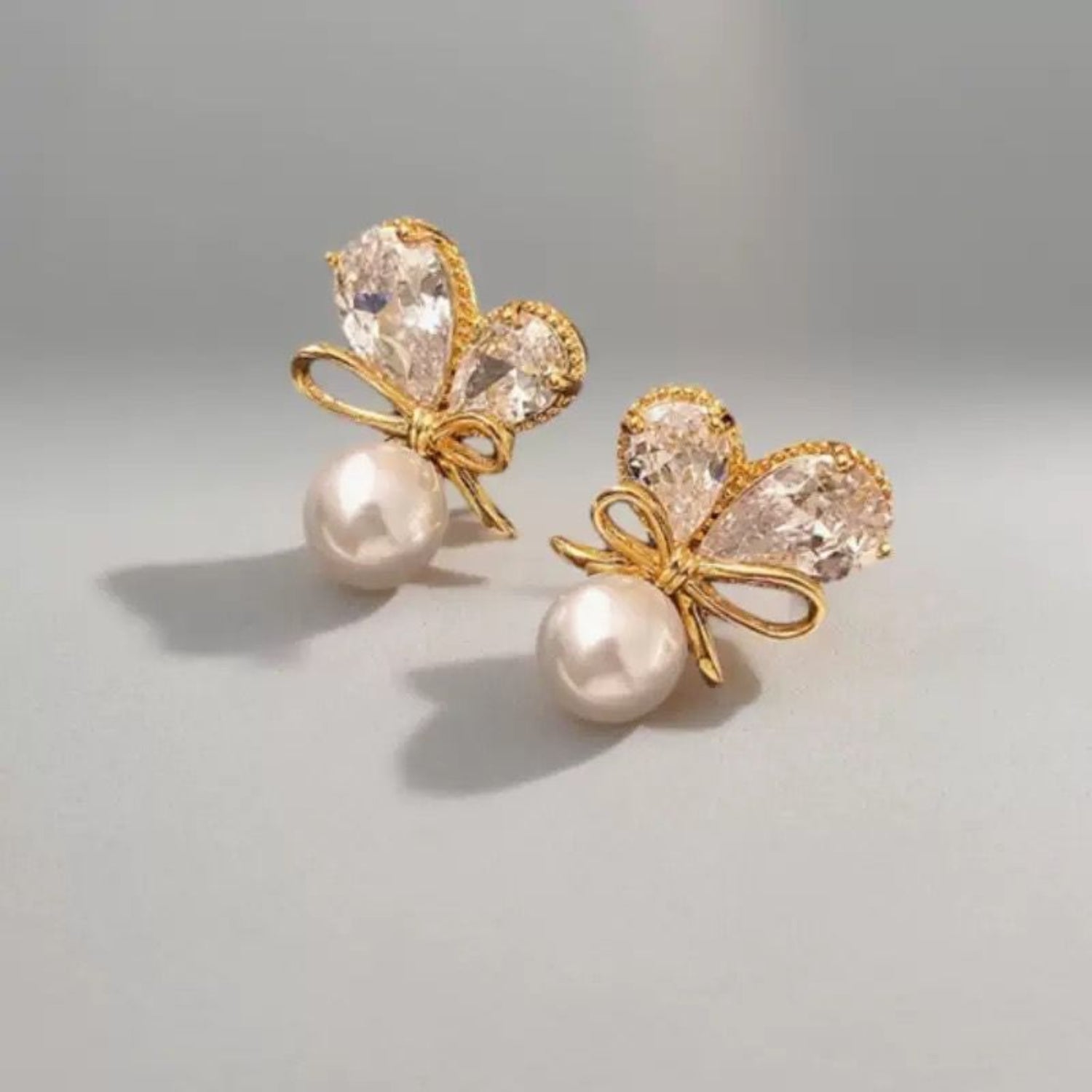 Gold Bow Pearl Butterfly Earrings JLT13536