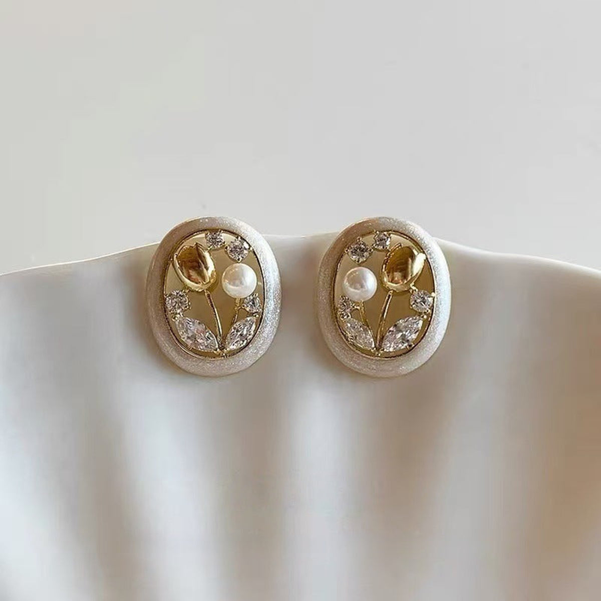 Gold-Tone Oval Floral Stud Earrings JLT14060
