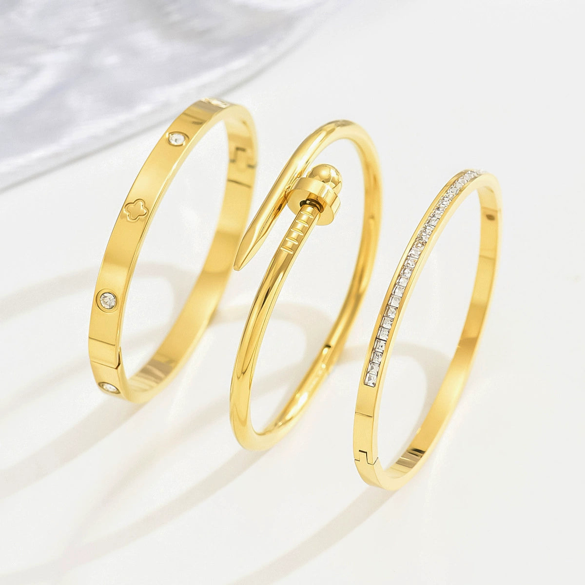 Trio of Elegant Gold-Tone Bangle Bracelets JLTB0710