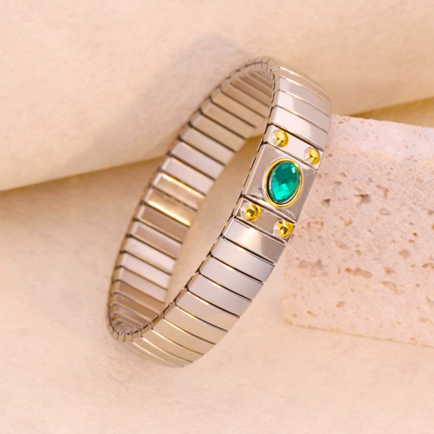 Silver-Toned Stretch Bracelet with Emerald Green Oval Stone & Golden Bead Accents JLTB0859