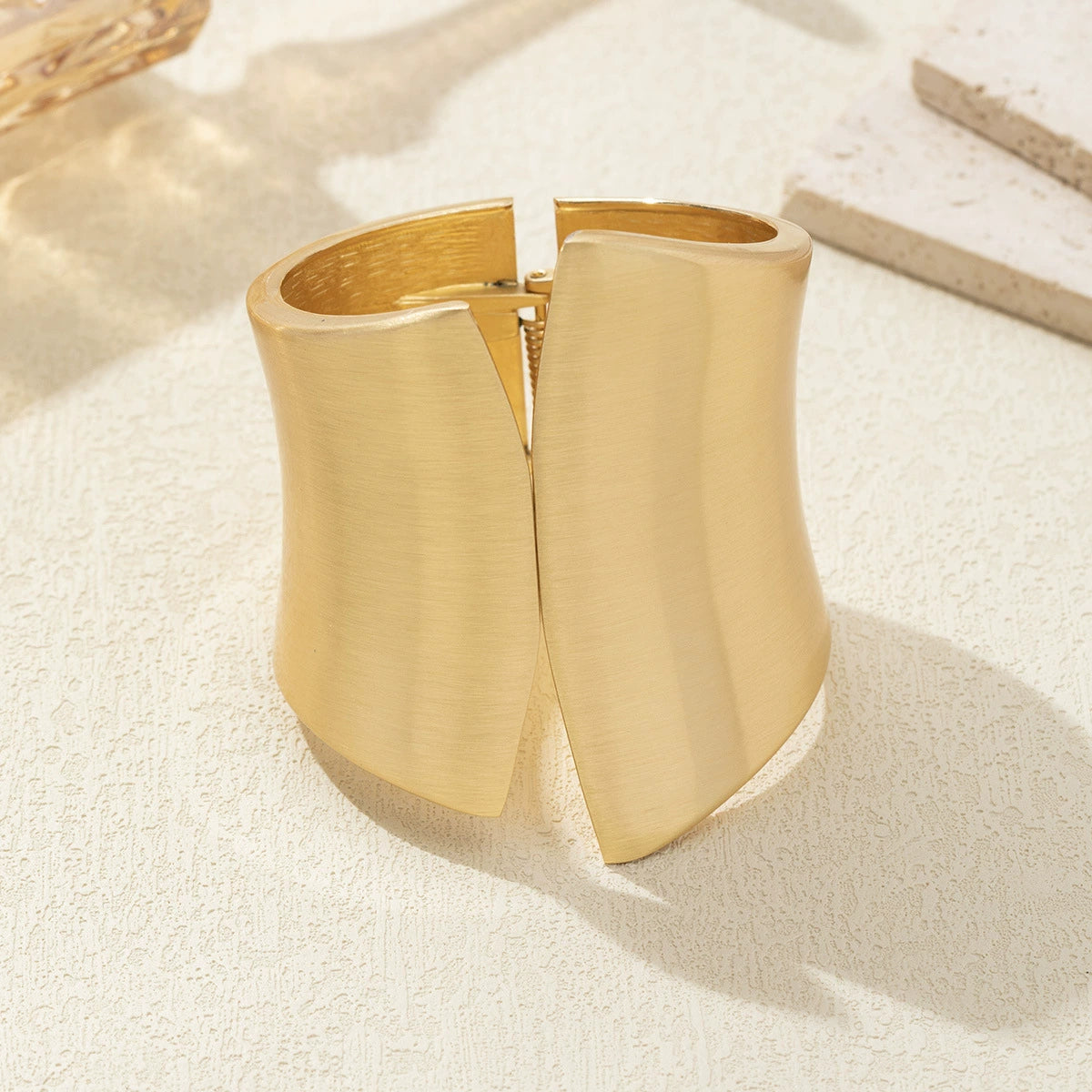 Just Lil Things Gold-Tone Flared Cuff Bracelet with Modern Design JLTB0946