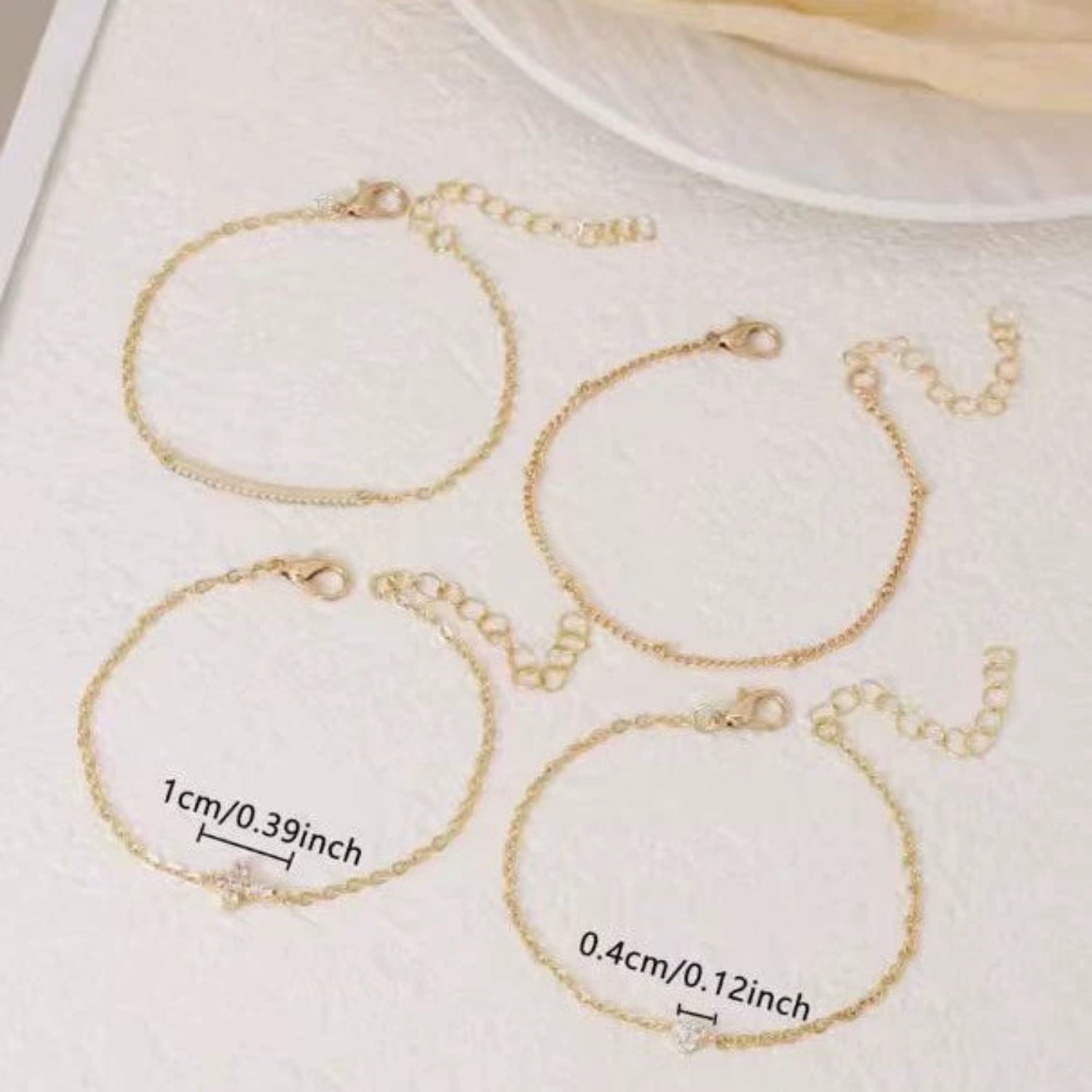 Delicate Gold Sparkling Bracelet Set JLTB1011 (Pack of 4)