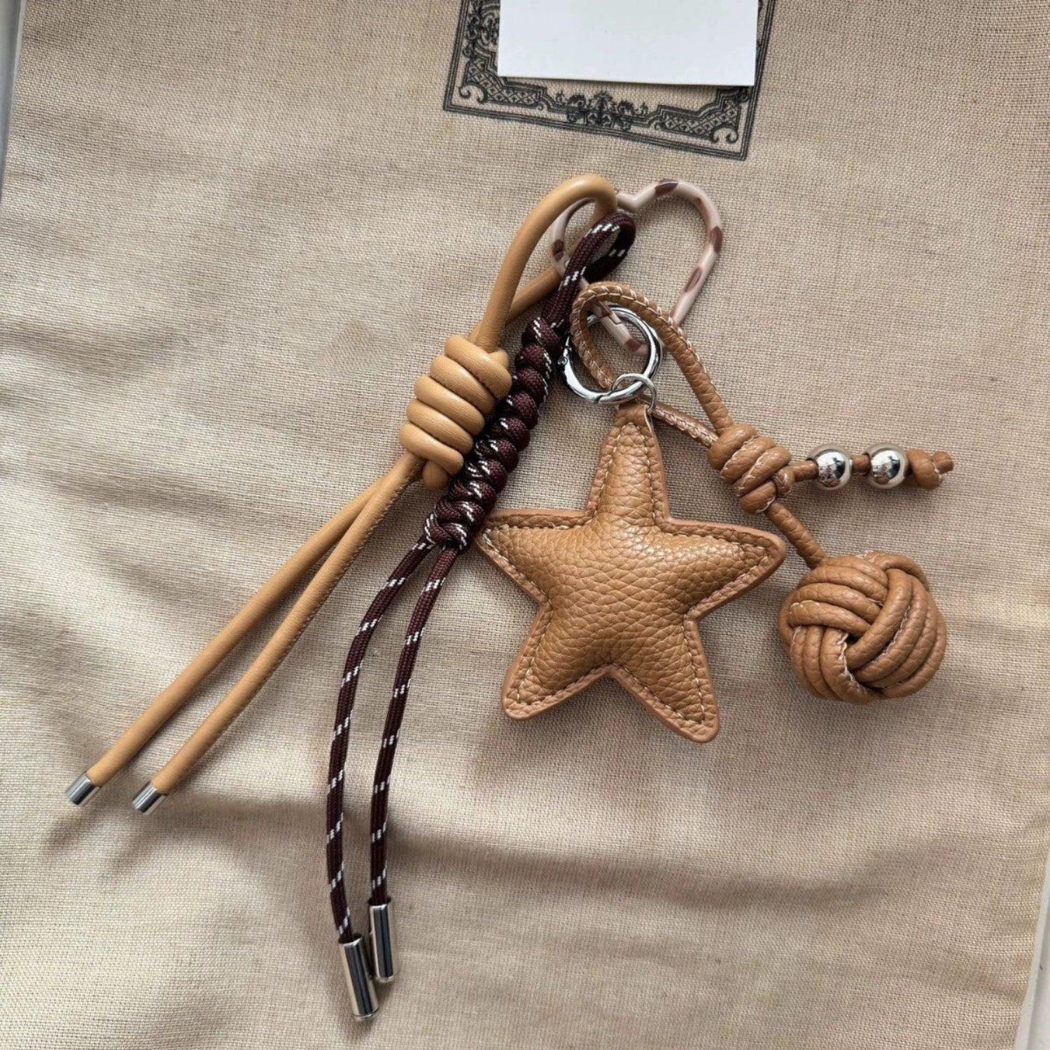 Tan Leather Star Tassel Keychain JLTKC0007