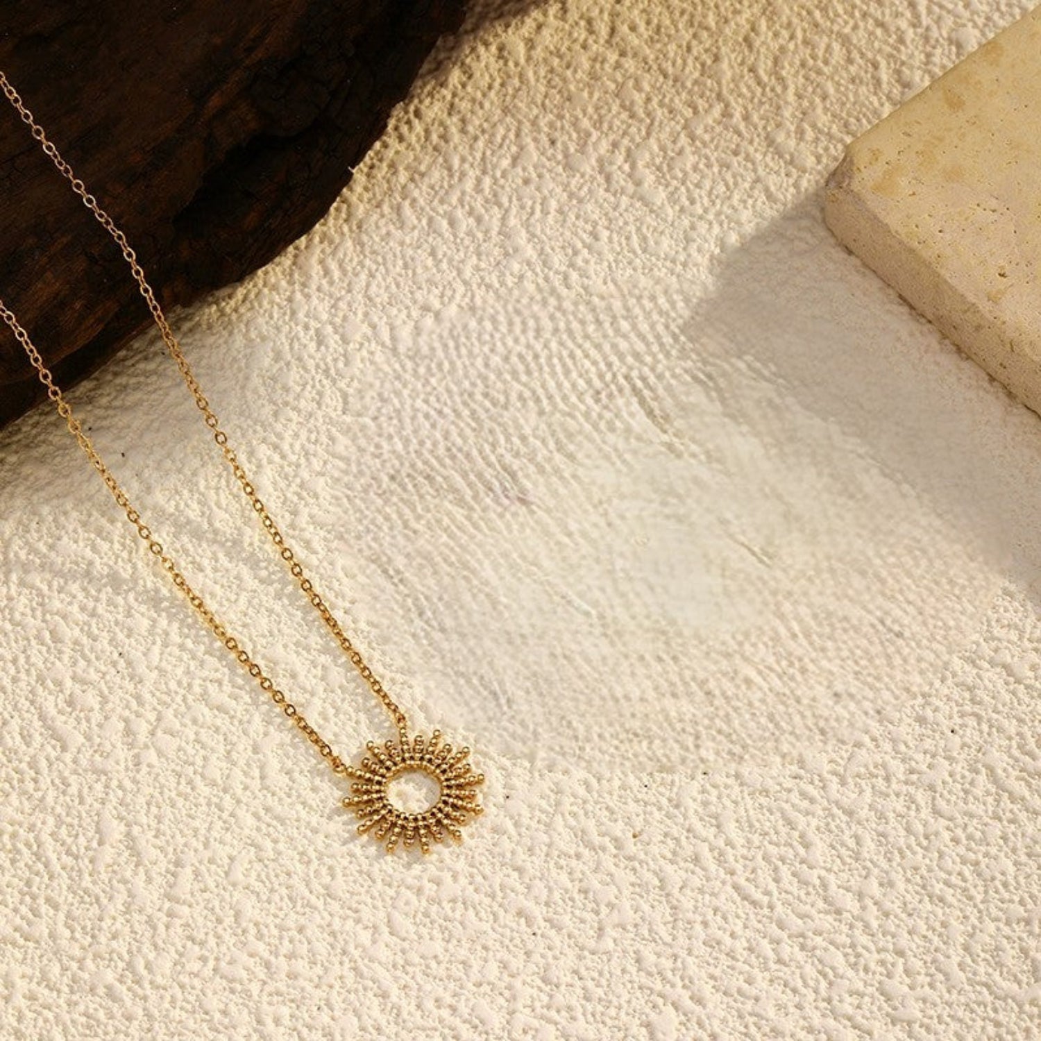 Golden Beaded Sunburst Pendant Necklace  JLTN1755