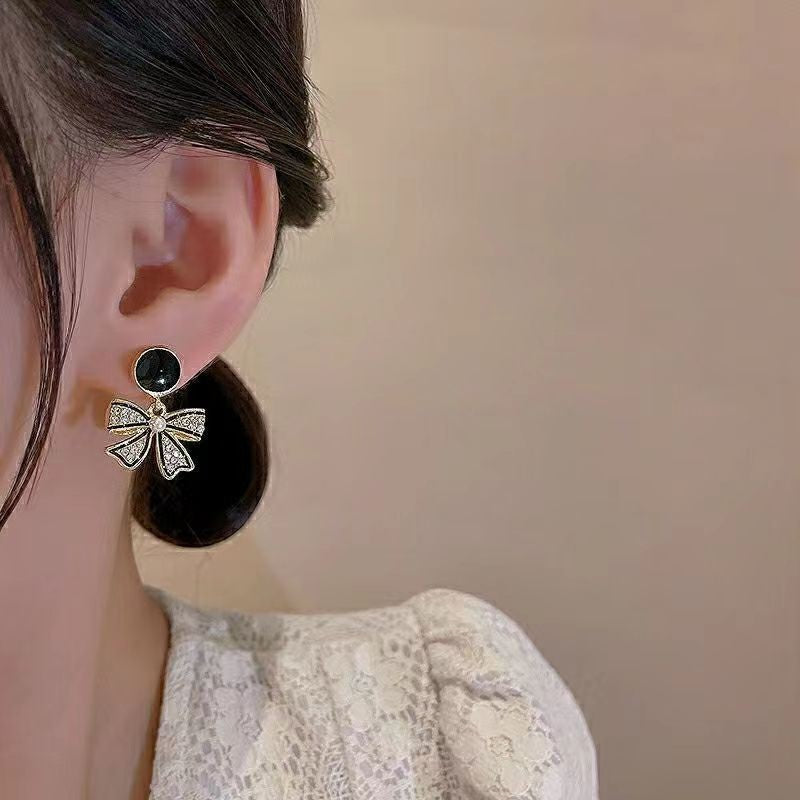 black bow earrings jlt13157