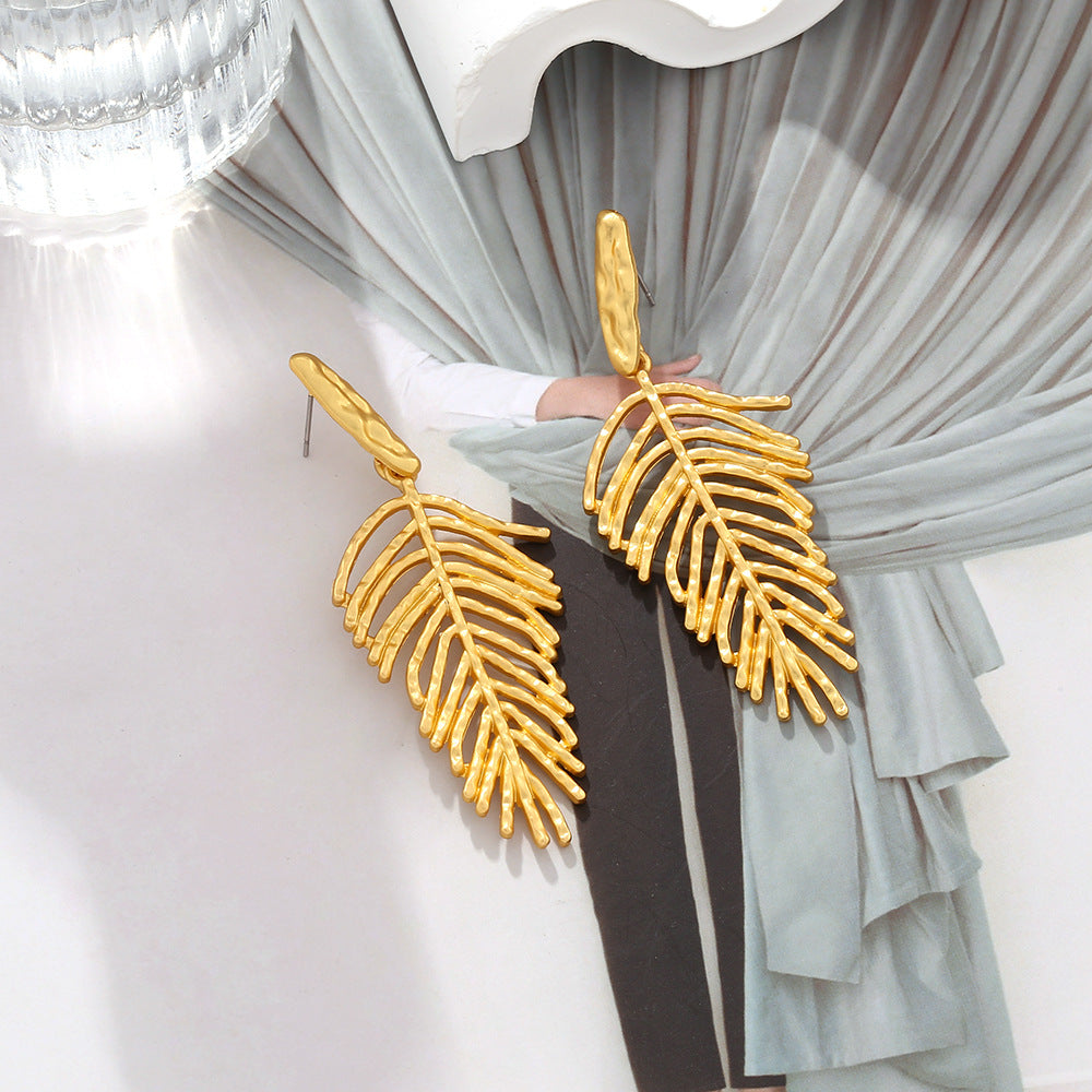 brand temperament long textured metal leaf shape earrings fashionable and versatile leaf flower earrings for women jlt13281