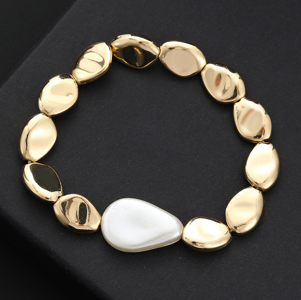 Justlilthings Golden Pebble Charm Bracelet with White Teardrop Accent – Elegant Minimal Design