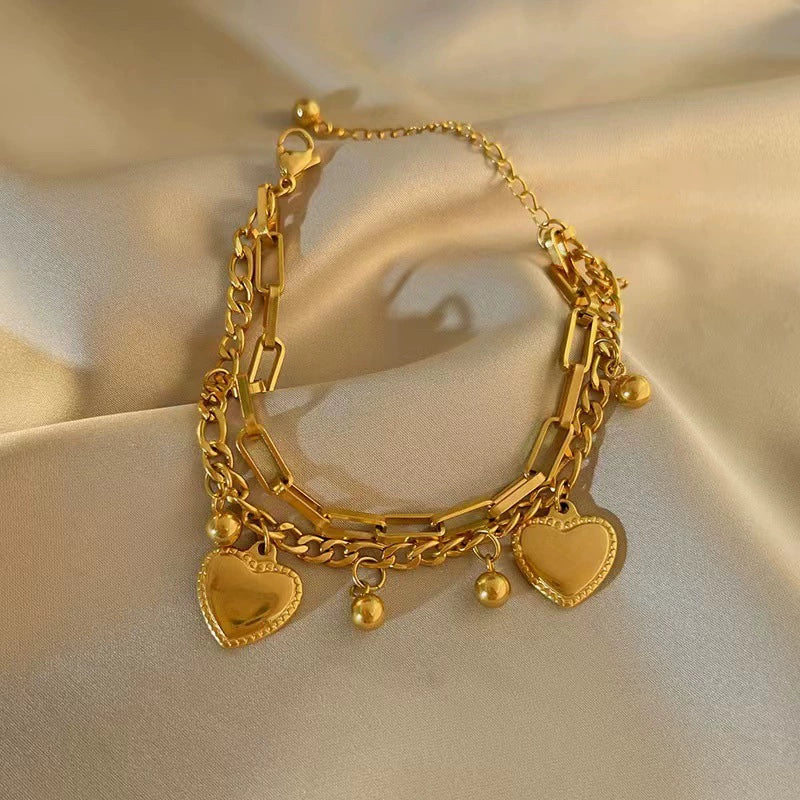 Just Lil Things Artificial Golden Heart Charm Bracelet & Link Chain Duo – Elegant Layered Set    Bracelets