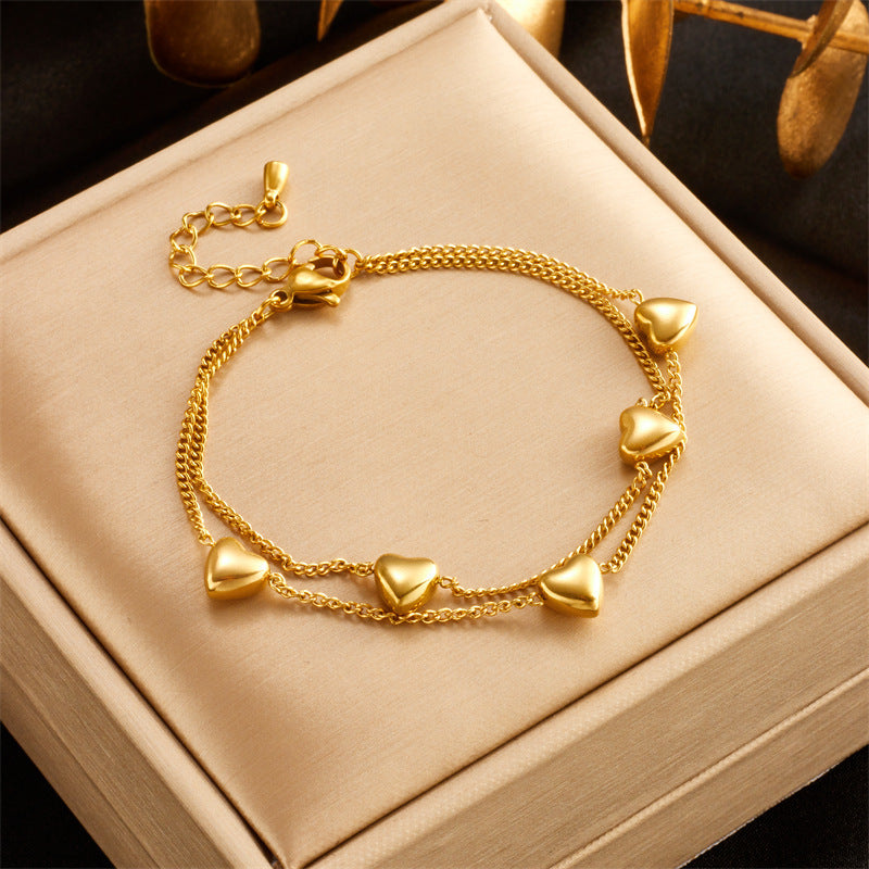 Just Lil Things Artificial Golden Heart Charm – Dual Chain with Minimal Heart Accents Bracelet jltb0531
