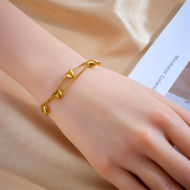 Just Lil Things Artificial Golden Heart Charm – Dual Chain with Minimal Heart Accents Bracelet jltb0531