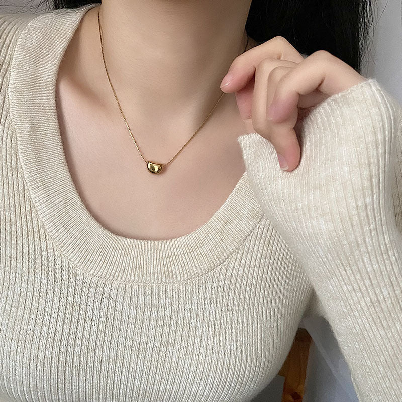 Golden Bean Titanium Pendant Necklace jltn1413