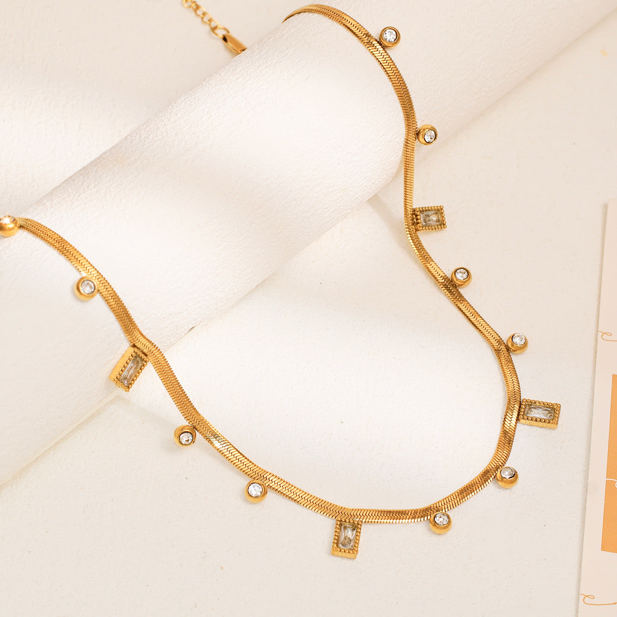 Just Lil Things Gold-Toned Snake Chain Necklace with Round & Rectangular Crystal Charms jltn1615