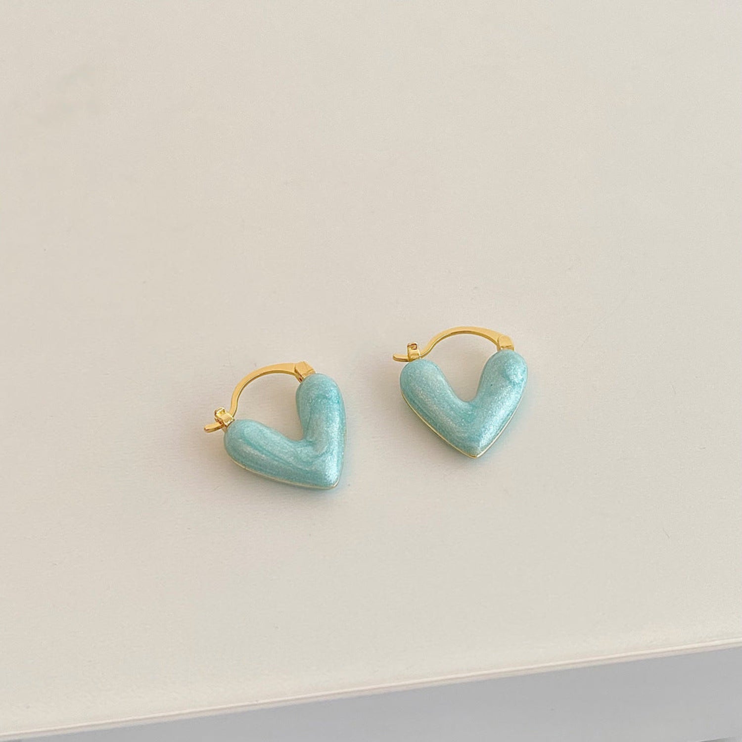 Gold Hoop Earrings with Turquoise Heart Charms jlt11727